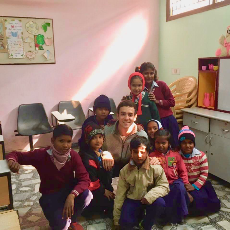 Volunteer from United States working with kids of Bhawan